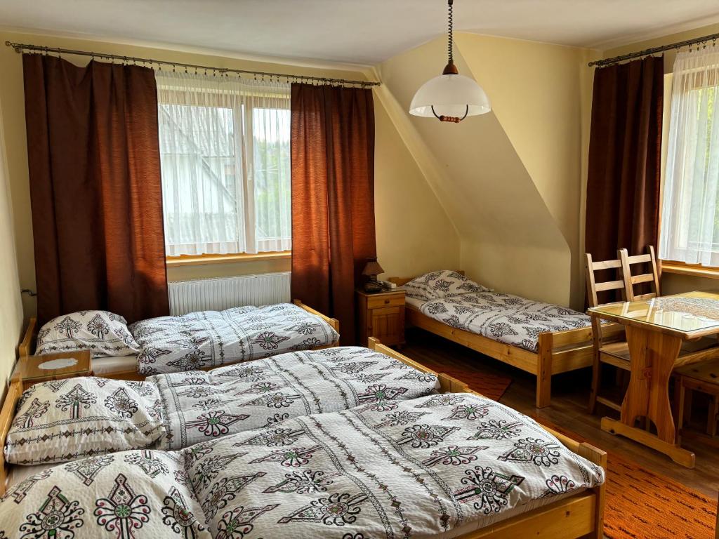 Quadruple Room with Private External Bathroom at Pokoje Gościnne U Gordona